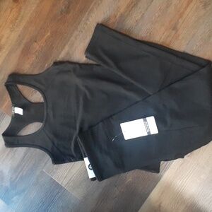 Black Sleeveless Top And Black Leggings